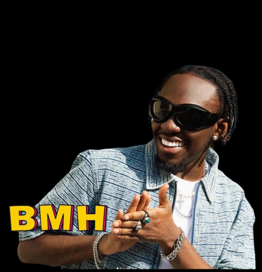 Bola BMH smiling in sunglasses with the BMH logo